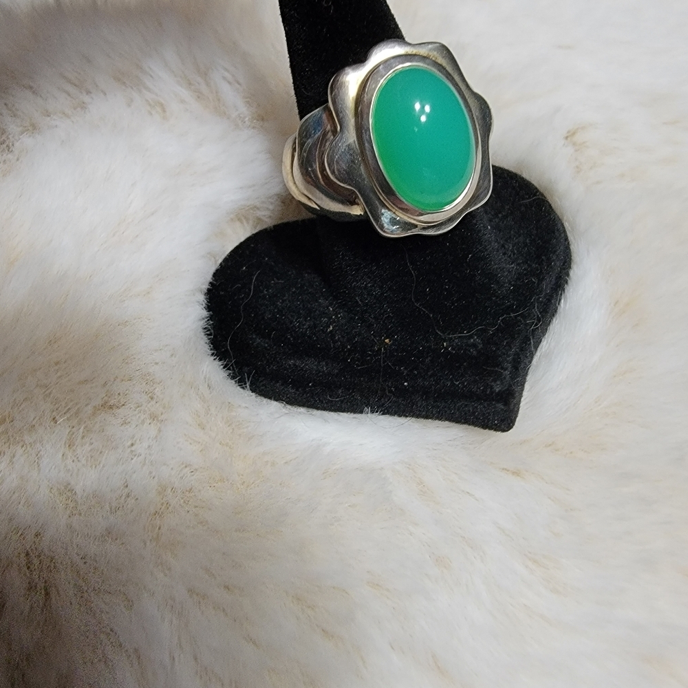 Pretty bright green ring in sterling.  Size 7.